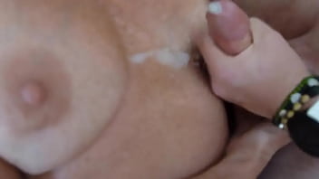 Stroking hard cock and cumming on mature tits