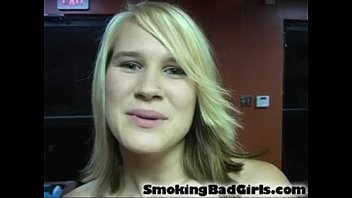 Teen smokes cigarettes while trying on different outfits  More on: 18CAMS.CO