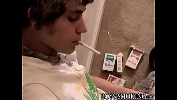 Cigar smoking twink jerks off hairy cock and jizzes in tray