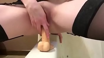 Home video - Cute girl in black stockings masturbating with dildo